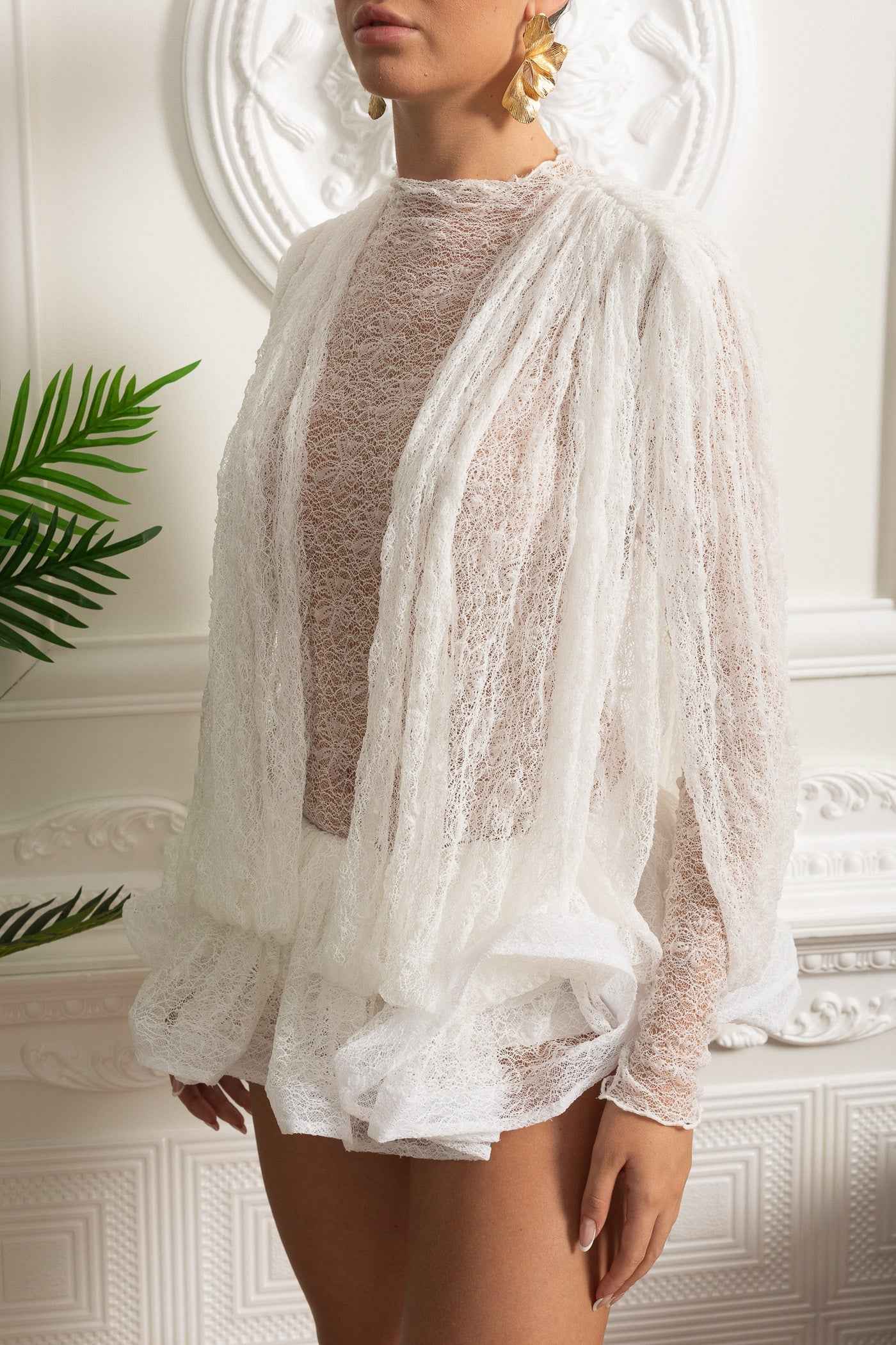 Delicate Long Sleeve Lace Dress with Ruffled Hem and Open Drape Front - White